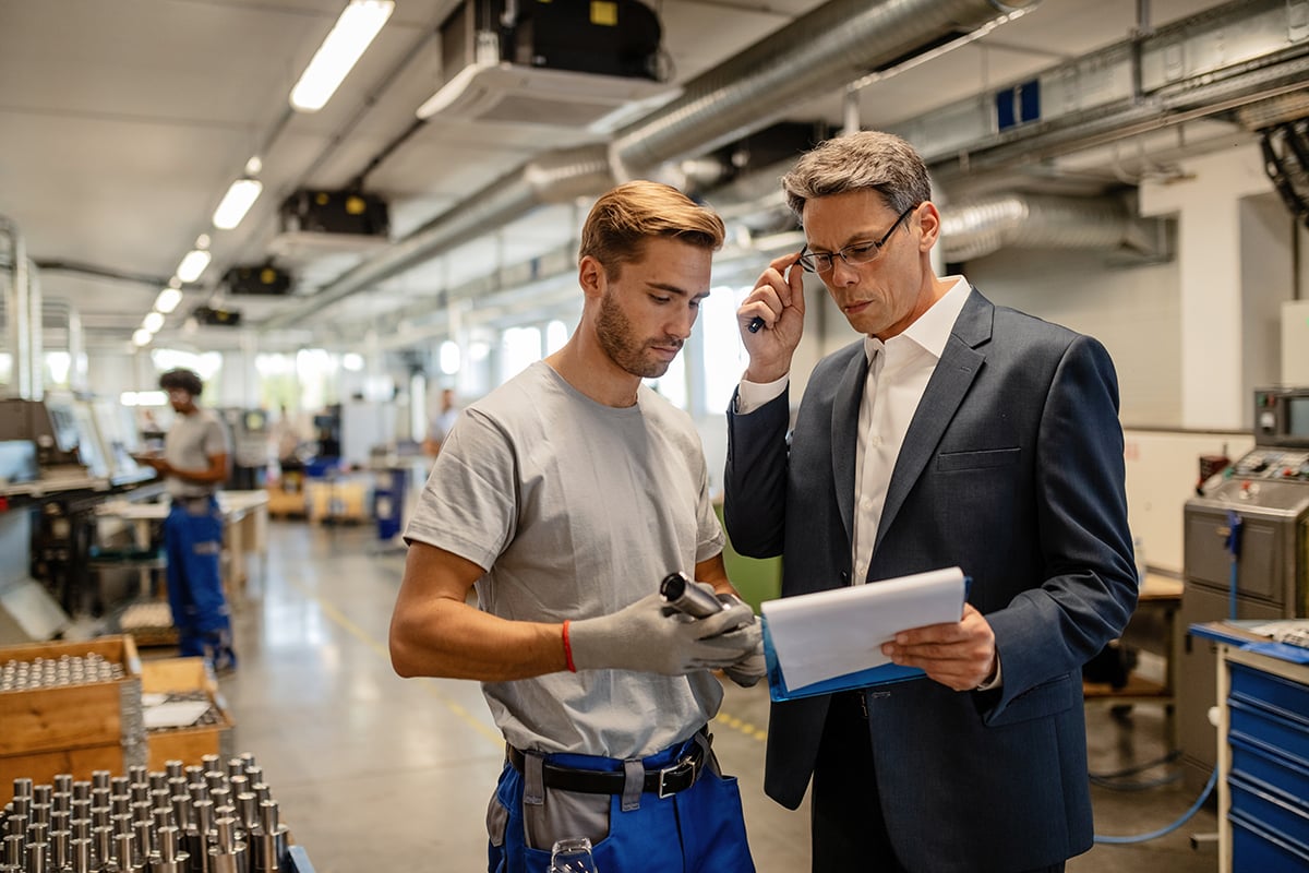 Machinery and equipment appraiser working with a business owner